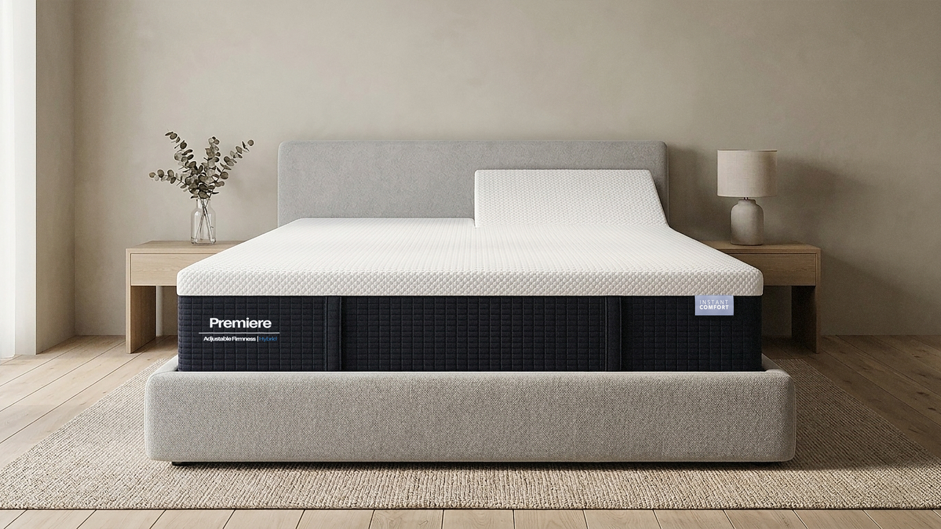 Mattress on a bed in a room with a lamp and plant