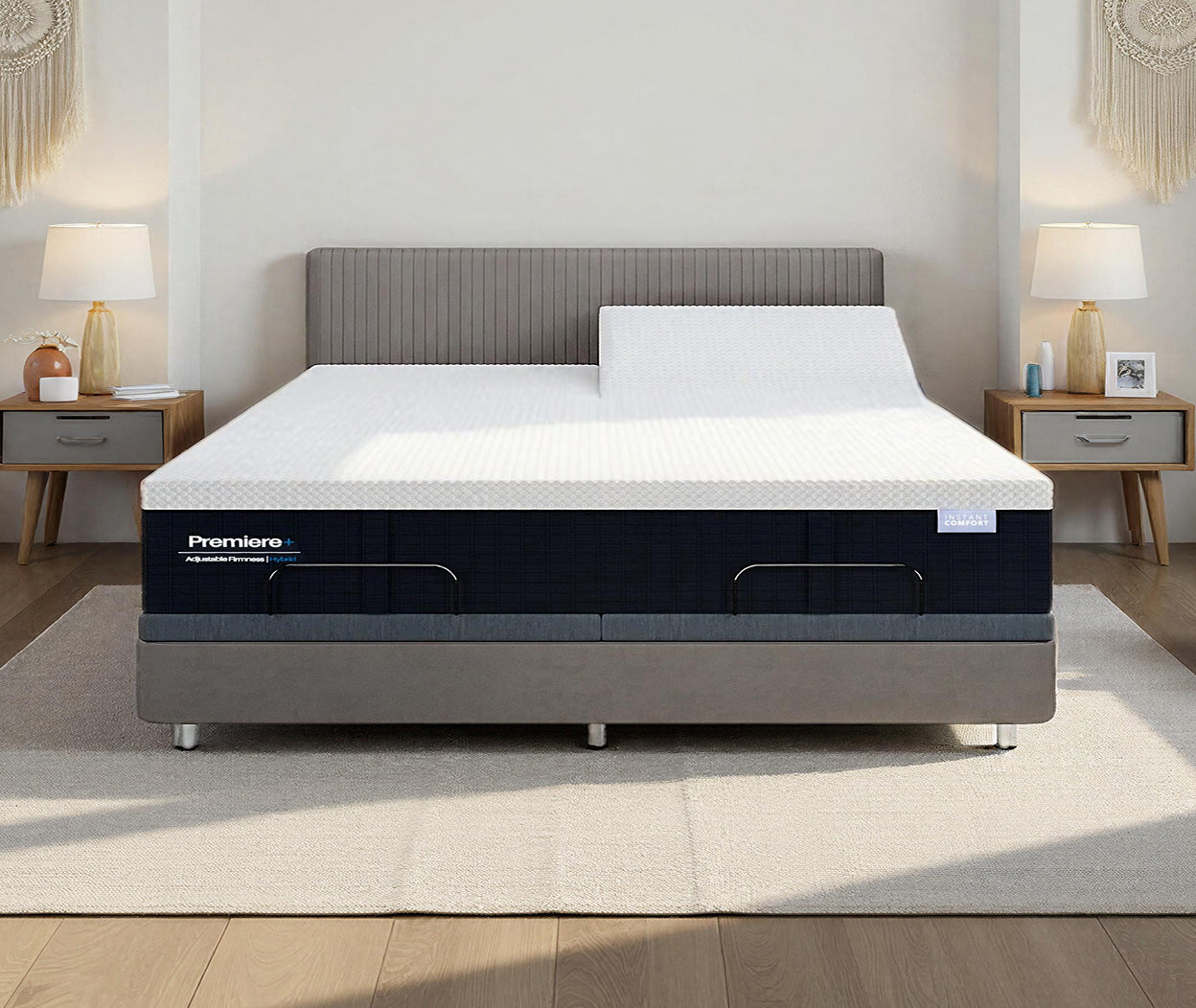 Gray bed frame with white mattress in a bedroom setting