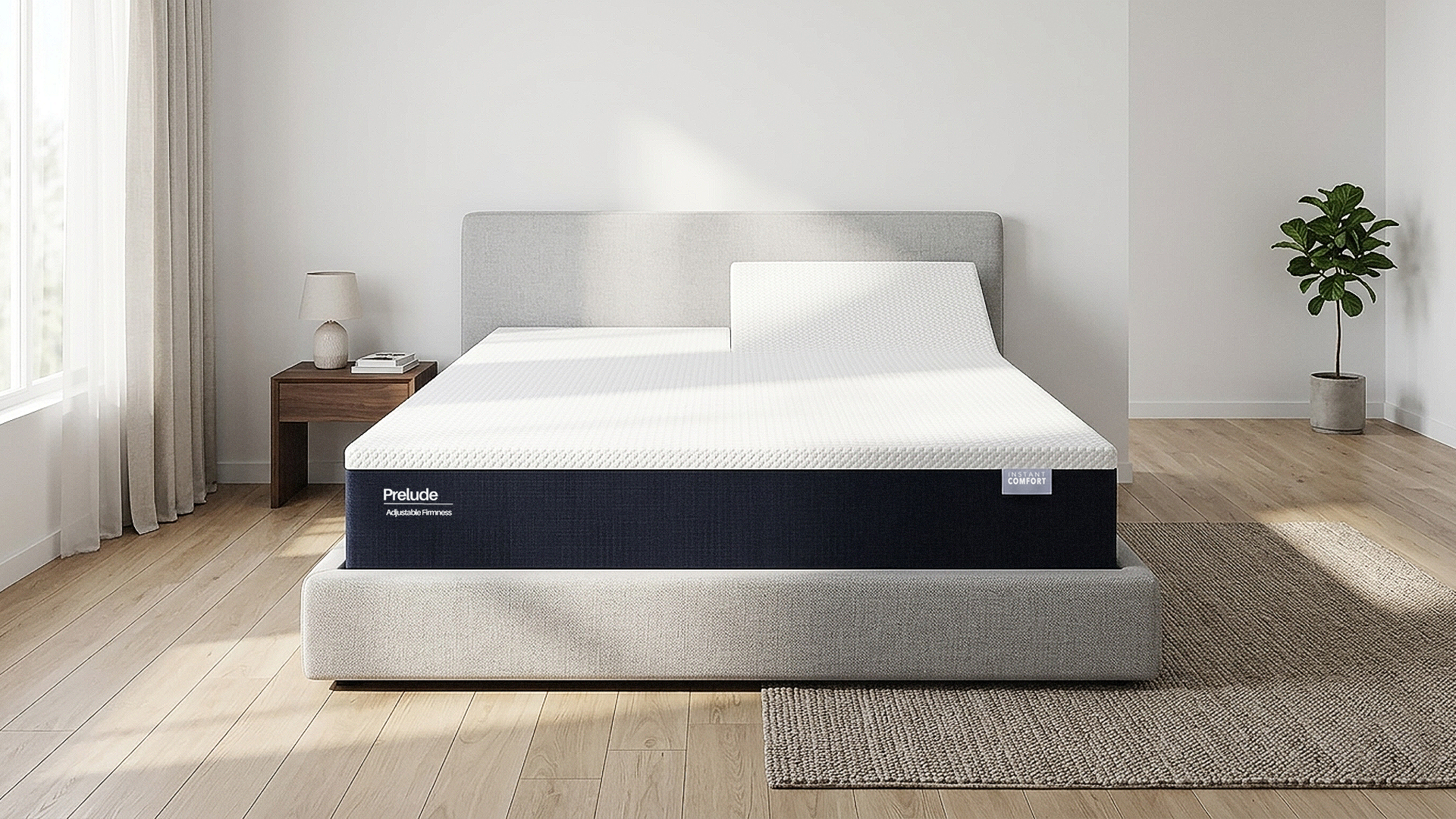 ProLate mattress in a bedroom setting with a side table and plant.