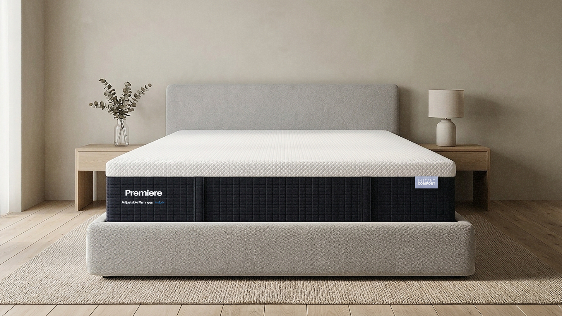 Mattress on a bed frame in a room with minimal decor