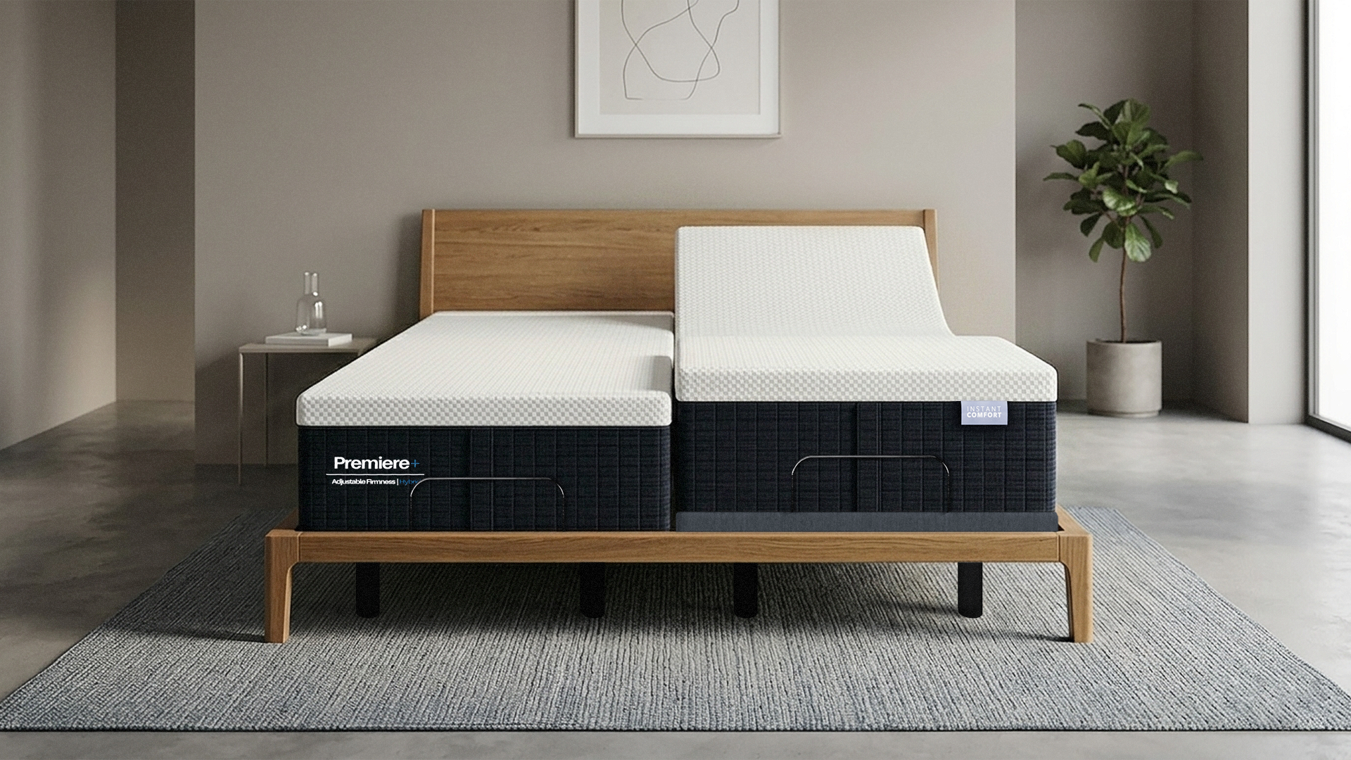 Two Prosenium mattresses on a wooden bed frame in a room with a plant and side table.