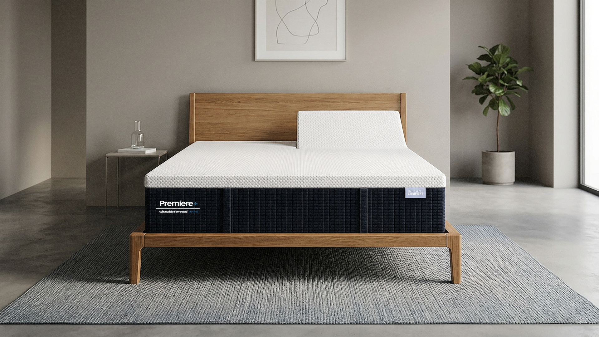 Bed with a mattress on a wooden bed frame in a room setting.