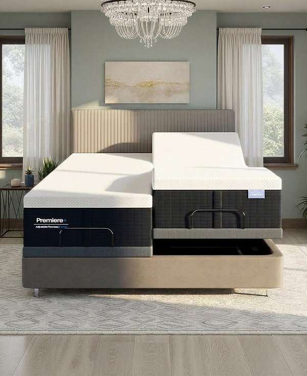 Bed with a Premier mattress in a room with windows and a chandelier.